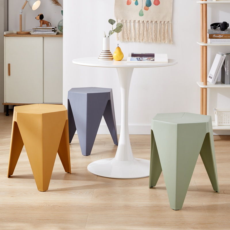 Nordic Plastic Stool in various colors, showcasing its modern design and non-slip surface, ideal for contemporary spaces.
