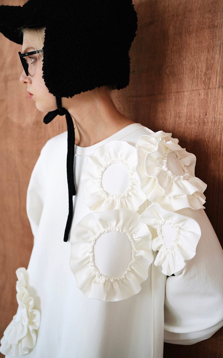 A stylish mid-length ruffled dress featuring a floral pattern, O-neck neckline, and full sleeves, perfect for winter wear.