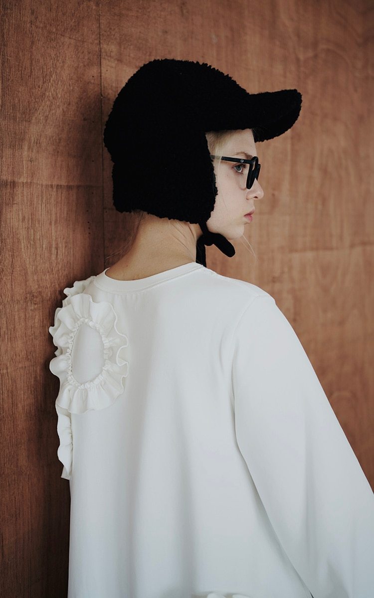 A stylish mid-length ruffled dress featuring a floral pattern, O-neck neckline, and full sleeves, perfect for winter wear.