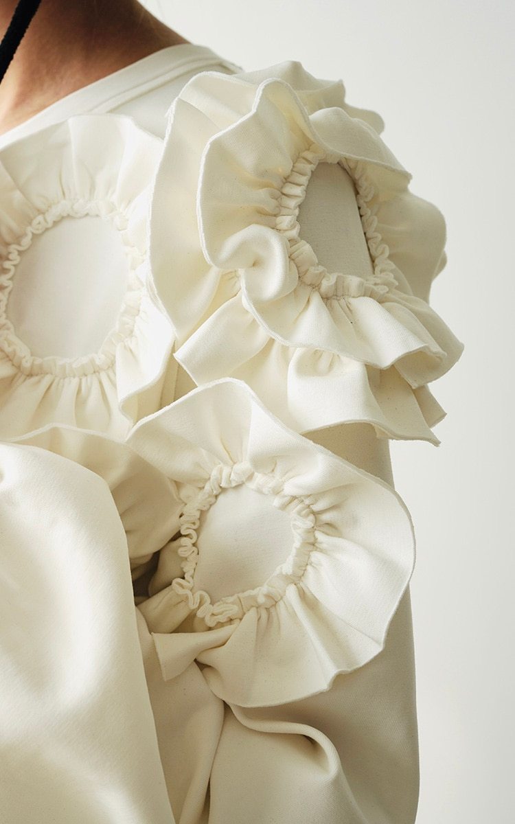 A stylish mid-length ruffled dress featuring a floral pattern, O-neck neckline, and full sleeves, perfect for winter wear.