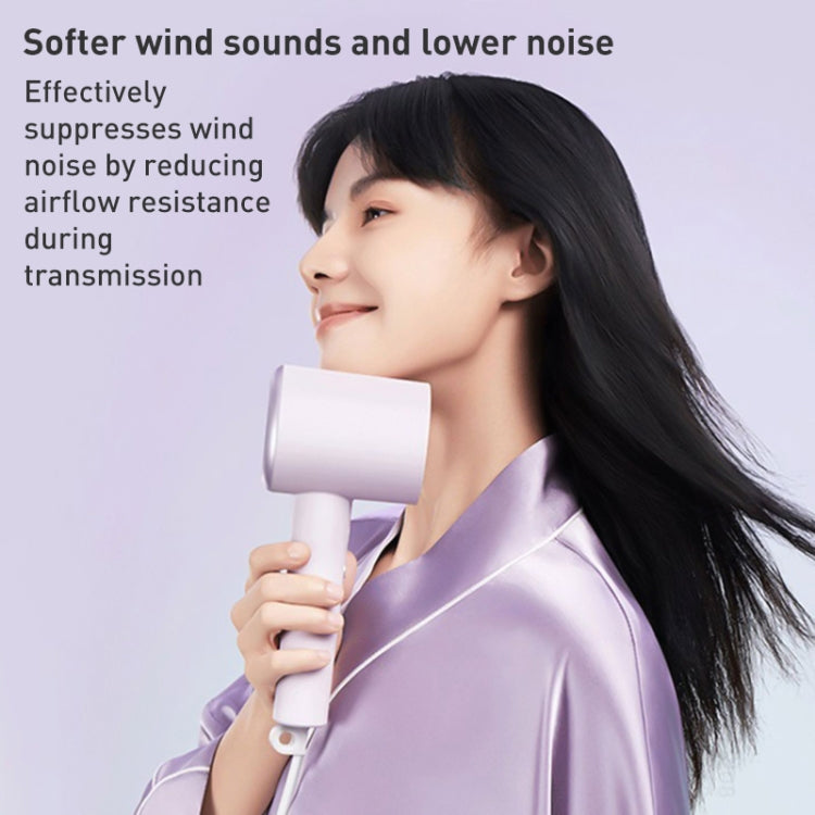 Original Xiaomi Mijia H301 Negative Ion Quick Drying Electric Hair Dryer in sleek design, showcasing its compact size and modern aesthetic.
