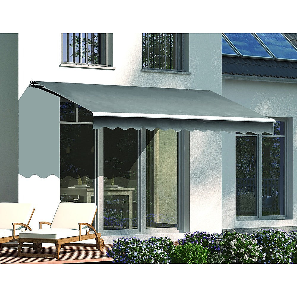 Grey outdoor folding arm awning retractable sunshade canopy, measuring 4.0m x 2.5m, installed over a patio.