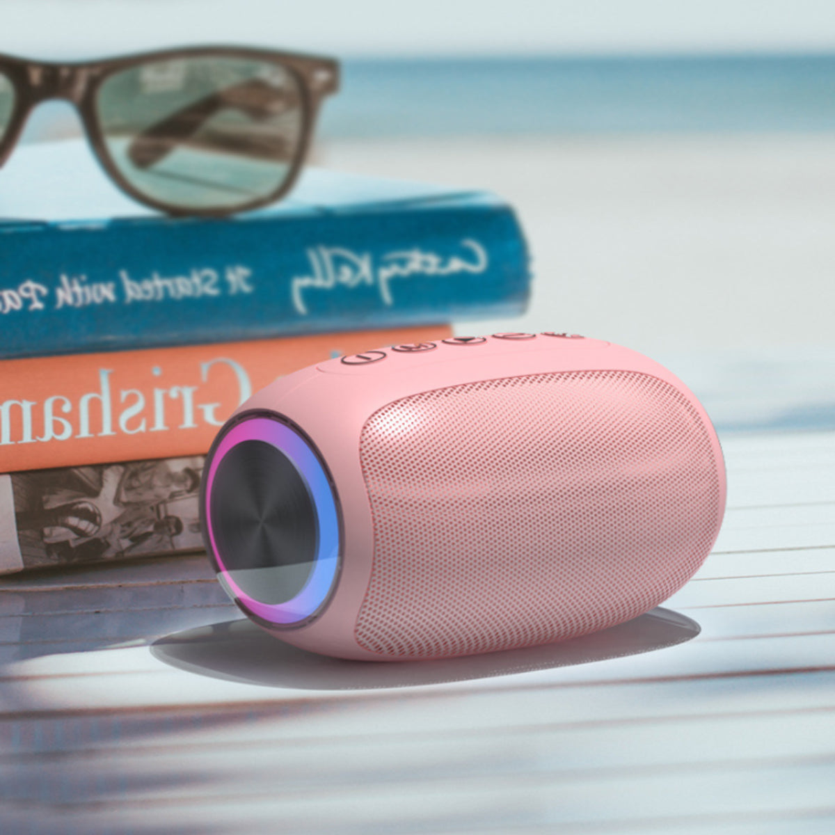 Oval Drum Bluetooth Speaker with LED ring light, showcasing its modern design and touch sensor controls.