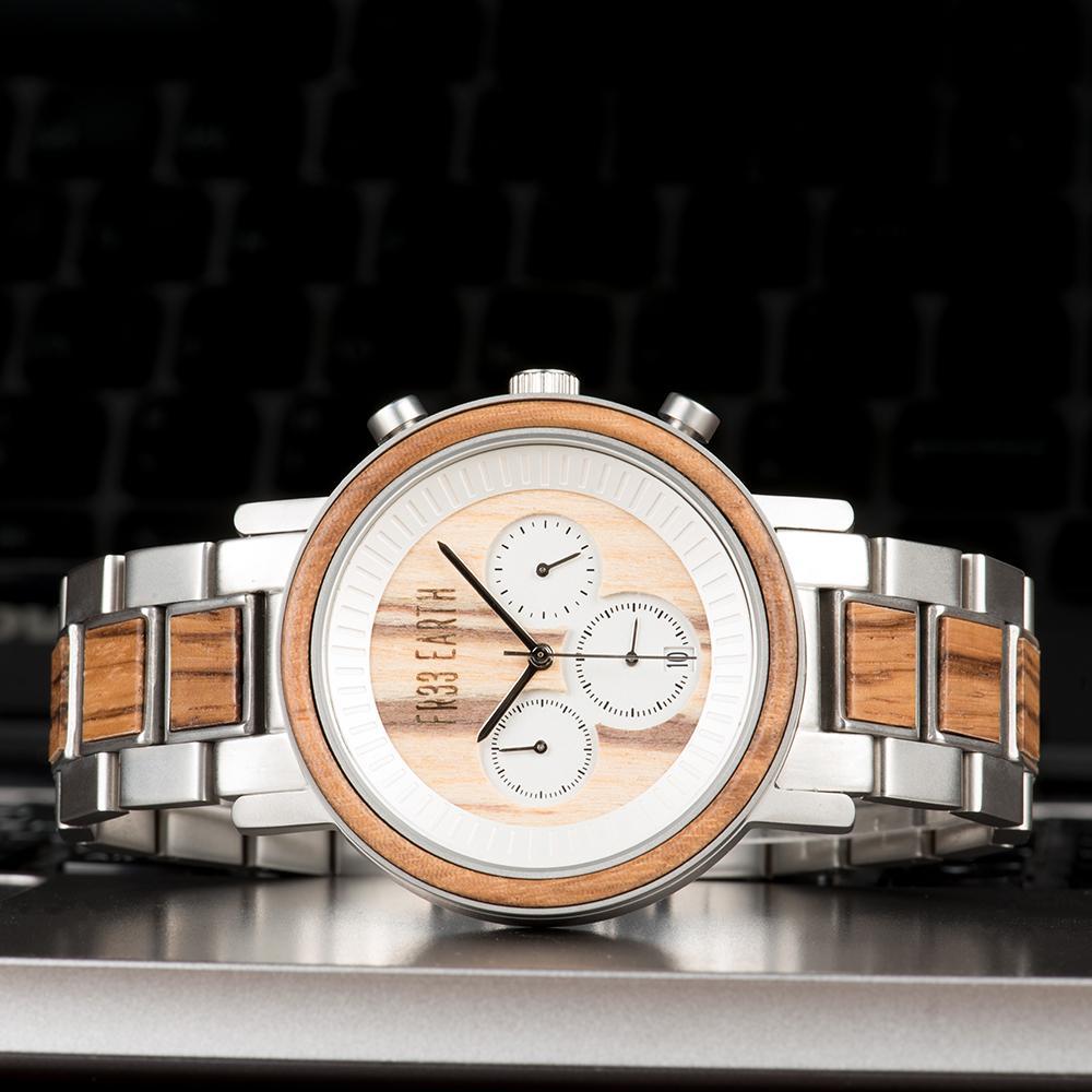 Ovo X premium wood watch made from Zebra Wood and stainless steel, featuring a light-colored wooden band and elegant design.