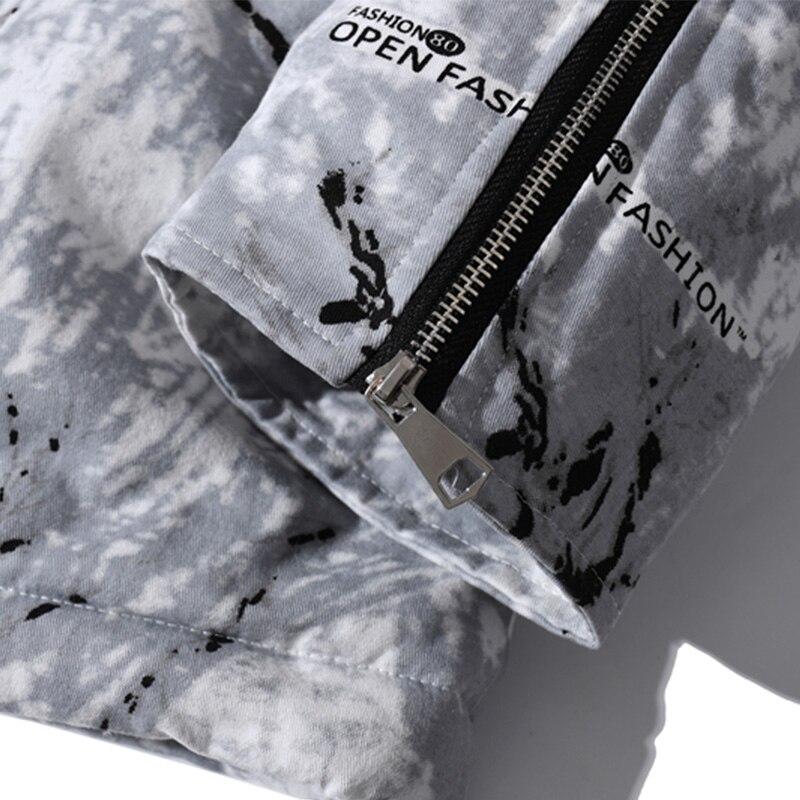 Men's parka jacket featuring a vibrant tie-dye print, hood, and zipper closure, perfect for winter fashion.