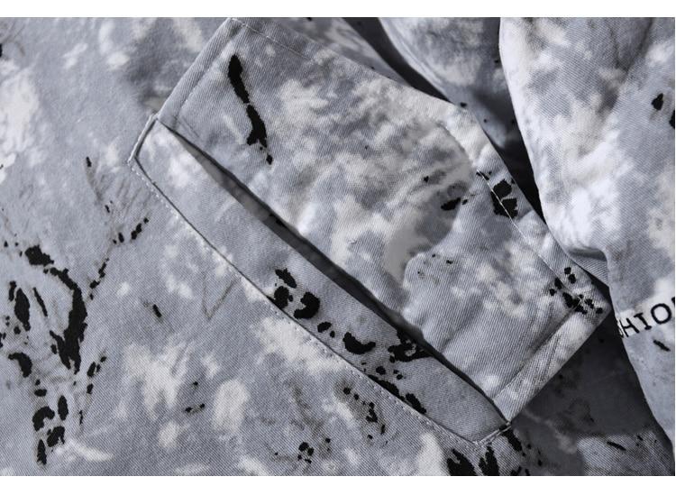 Men's parka jacket featuring a vibrant tie-dye print, hood, and zipper closure, perfect for winter fashion.