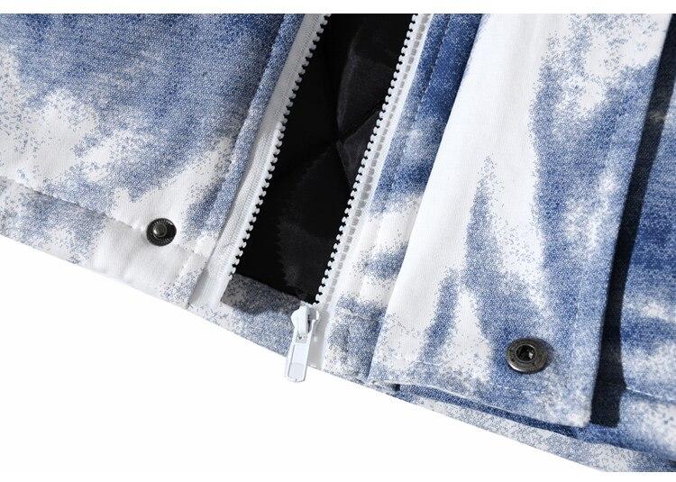 Men's winter parka jacket featuring a distressed tie dye design, hooded collar, and padded cotton filling for warmth.