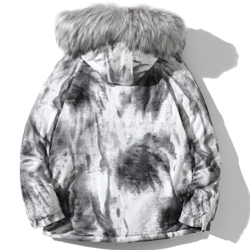Men's winter parka jacket featuring a distressed tie dye design, hooded collar, and padded cotton filling for warmth.