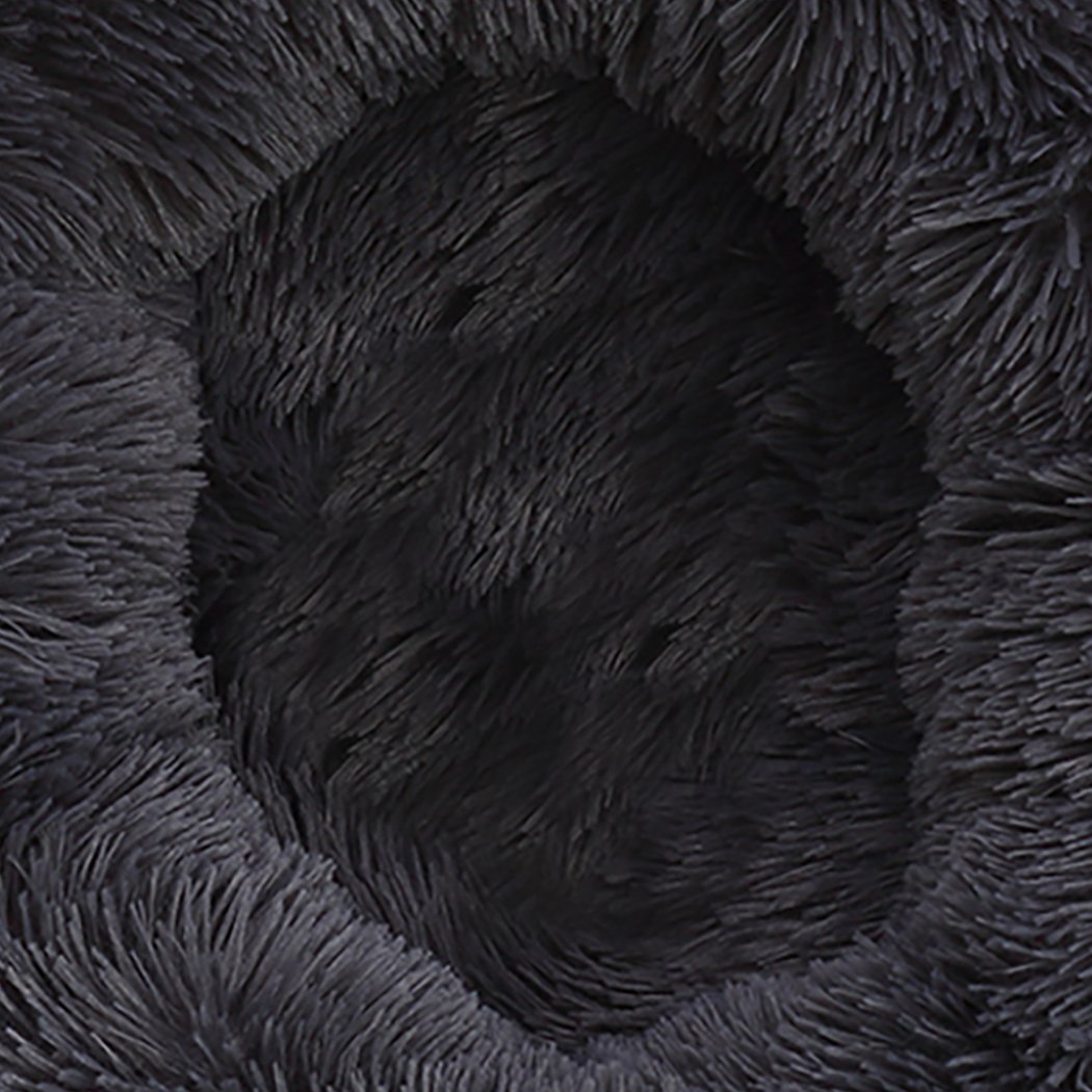PaWz Pet Bed in dark grey, donut-shaped design with plush surface and non-slip bottom, ideal for dogs and cats.