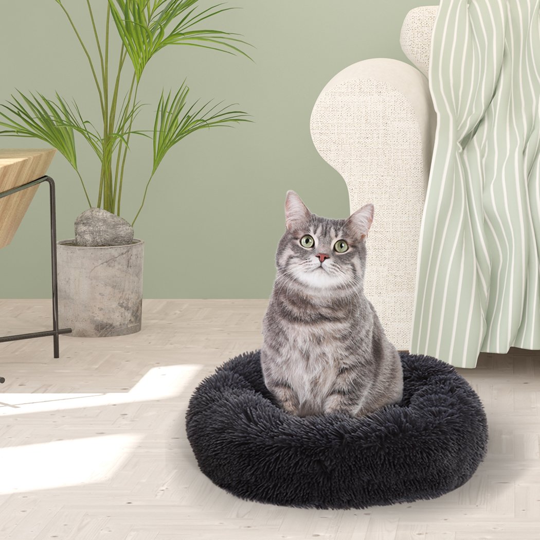 PaWz Pet Bed in dark grey, donut-shaped design with plush surface and non-slip bottom, ideal for dogs and cats.
