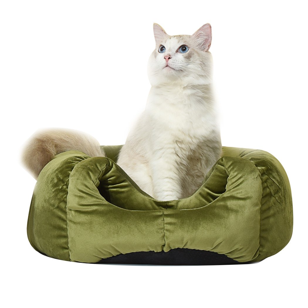 Cozy green pet bed designed as a cave and donut shape for cats, made from soft flannel material, perfect for winter comfort.