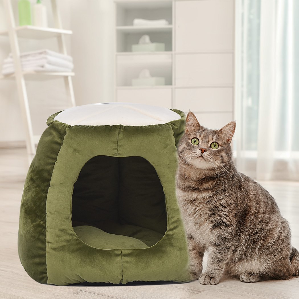 Cozy green pet bed designed as a cave and donut shape for cats, made from soft flannel material, perfect for winter comfort.