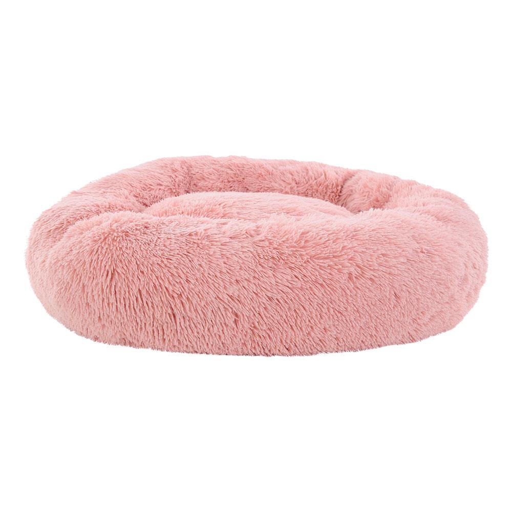 Large pink calming pet bed for dogs and cats, featuring a soft surface, non-slip base, and removable cover for easy cleaning.
