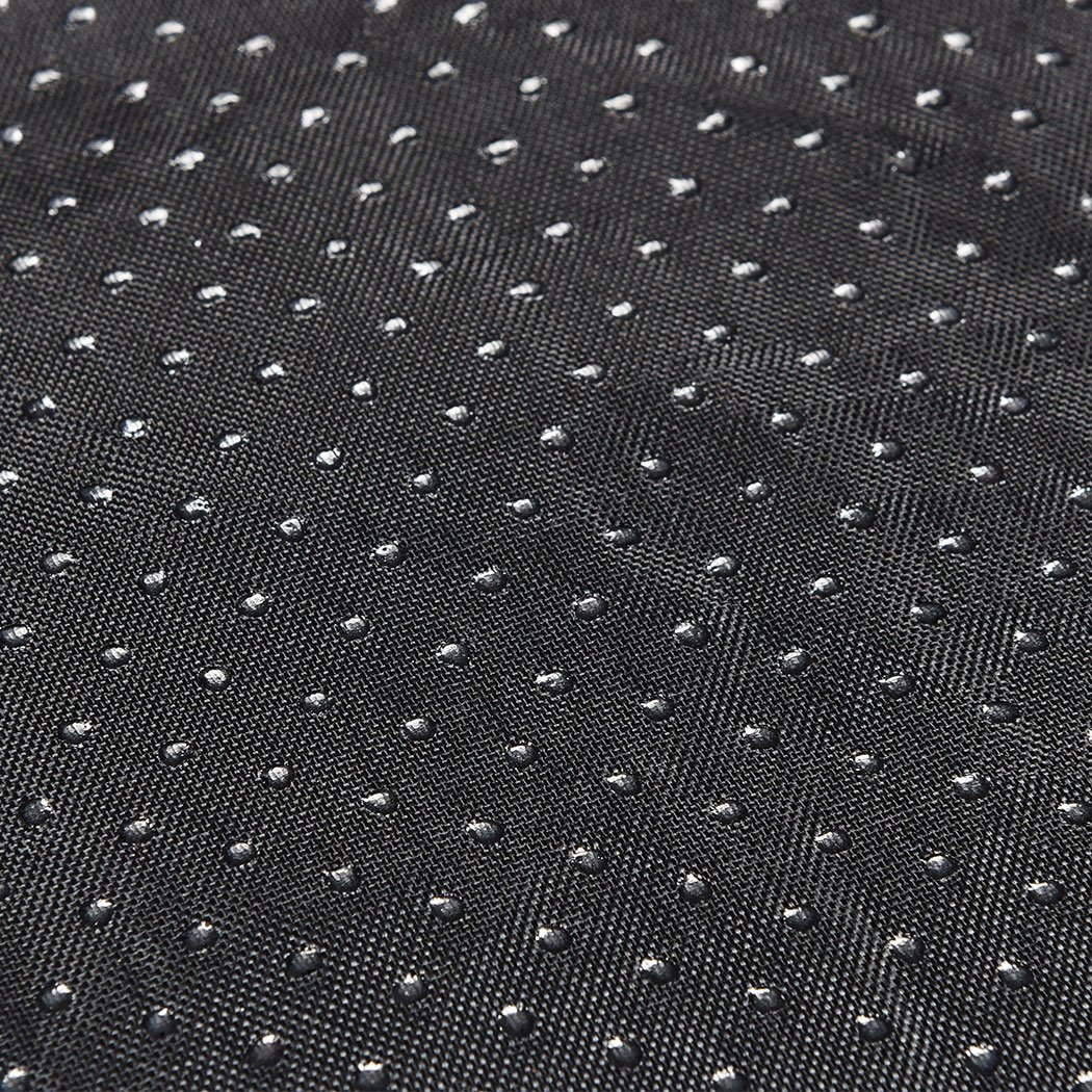 A soft plush donut-shaped pet bed in grey, designed for dogs and cats, featuring a cozy and inviting surface for pets to relax and sleep comfortably.