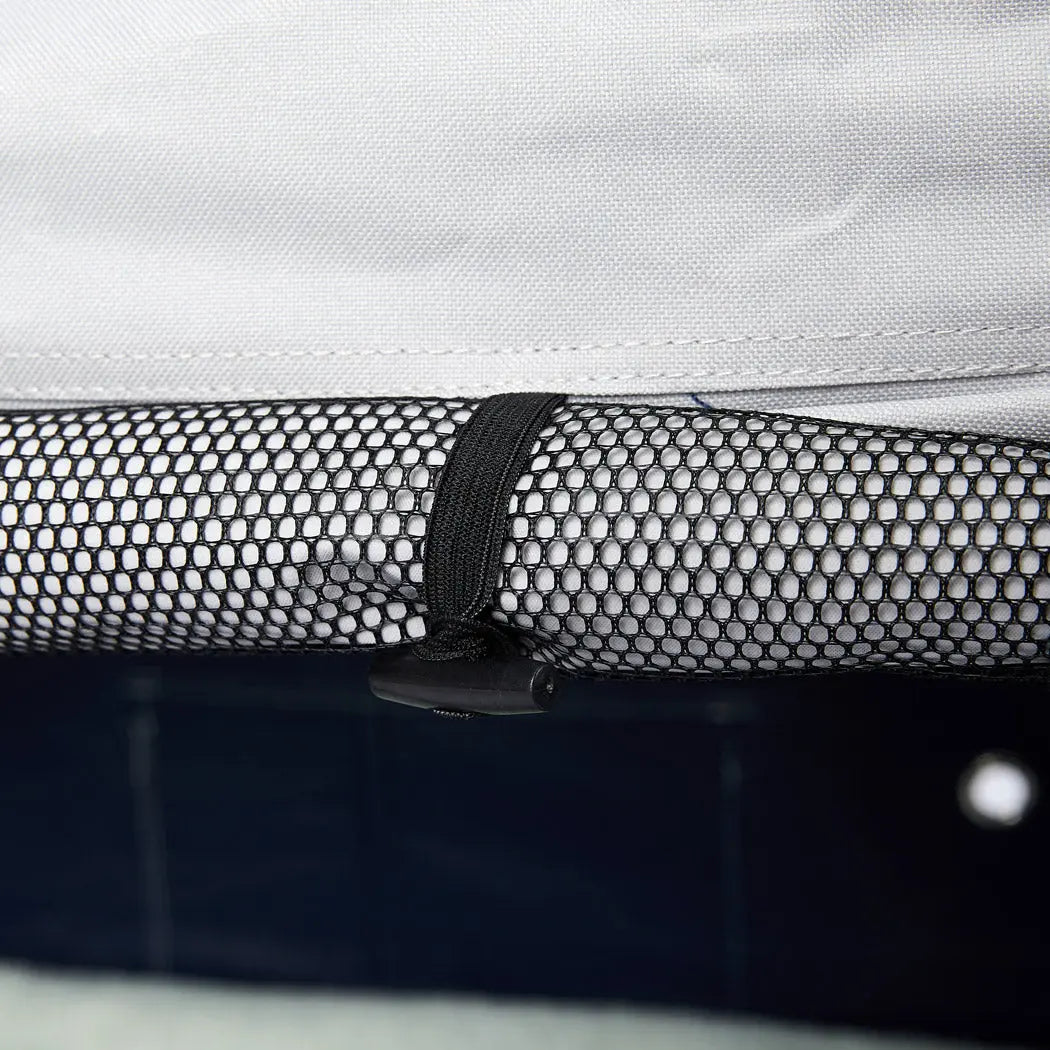 Spacious Pet Carrier Bag for dogs and puppies, featuring a ventilated canopy and durable design, perfect for outdoor travel.