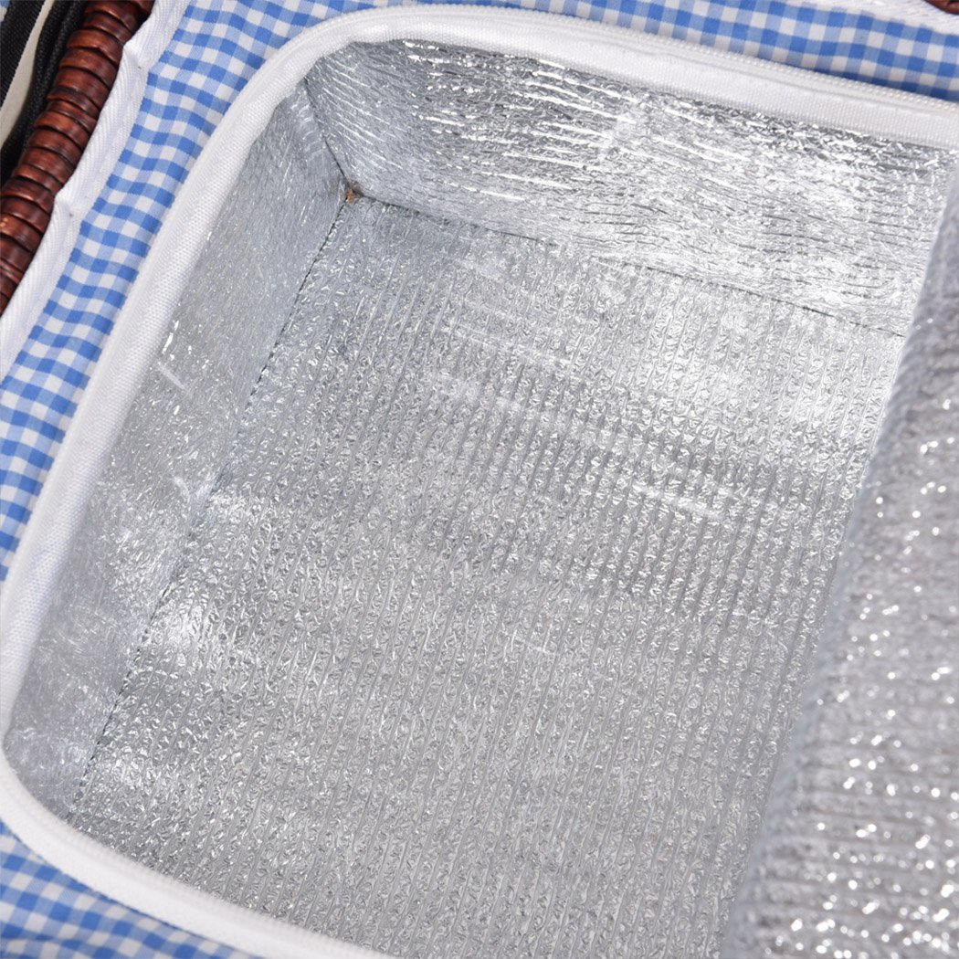 A stylish 4-person picnic basket set made of willow, featuring PU leather straps, an insulated bag, and a matching blanket, perfect for outdoor dining.