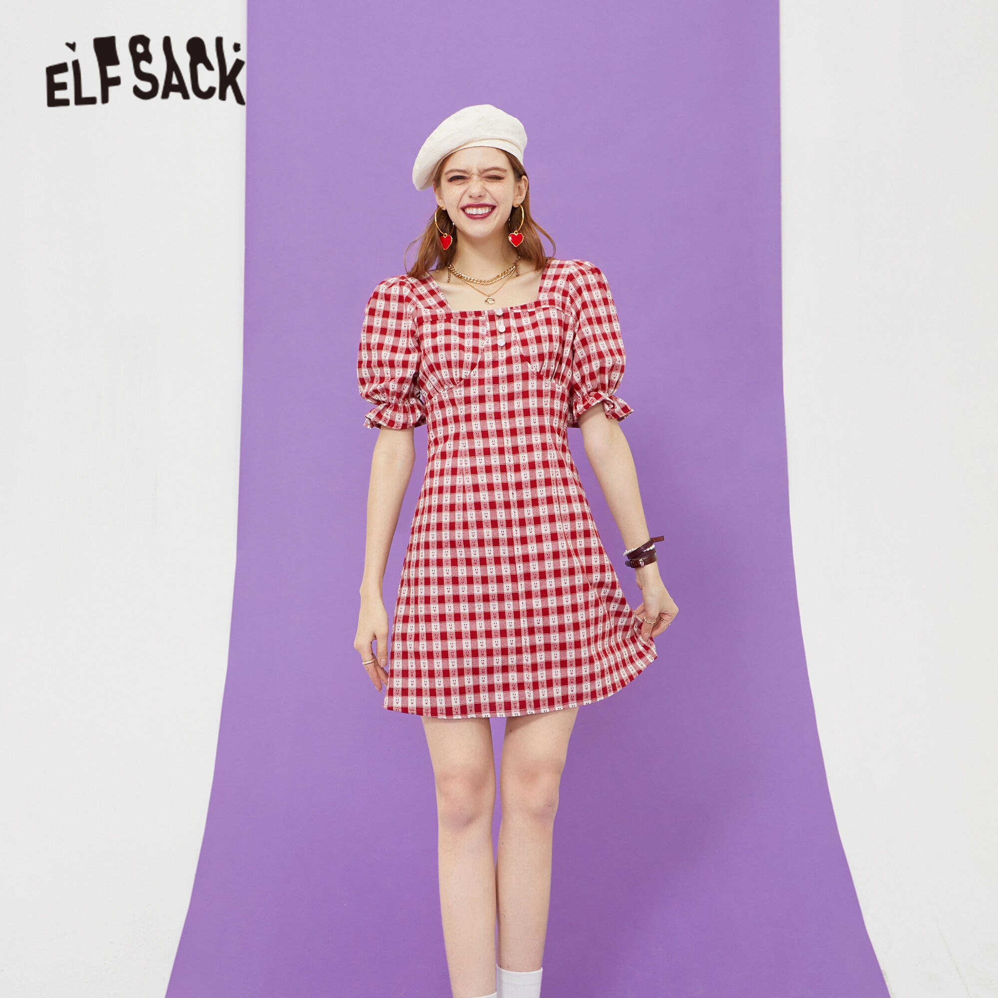 A stylish plaid vintage dress for women featuring high puff sleeves and a flattering A-line silhouette, perfect for summer outings.