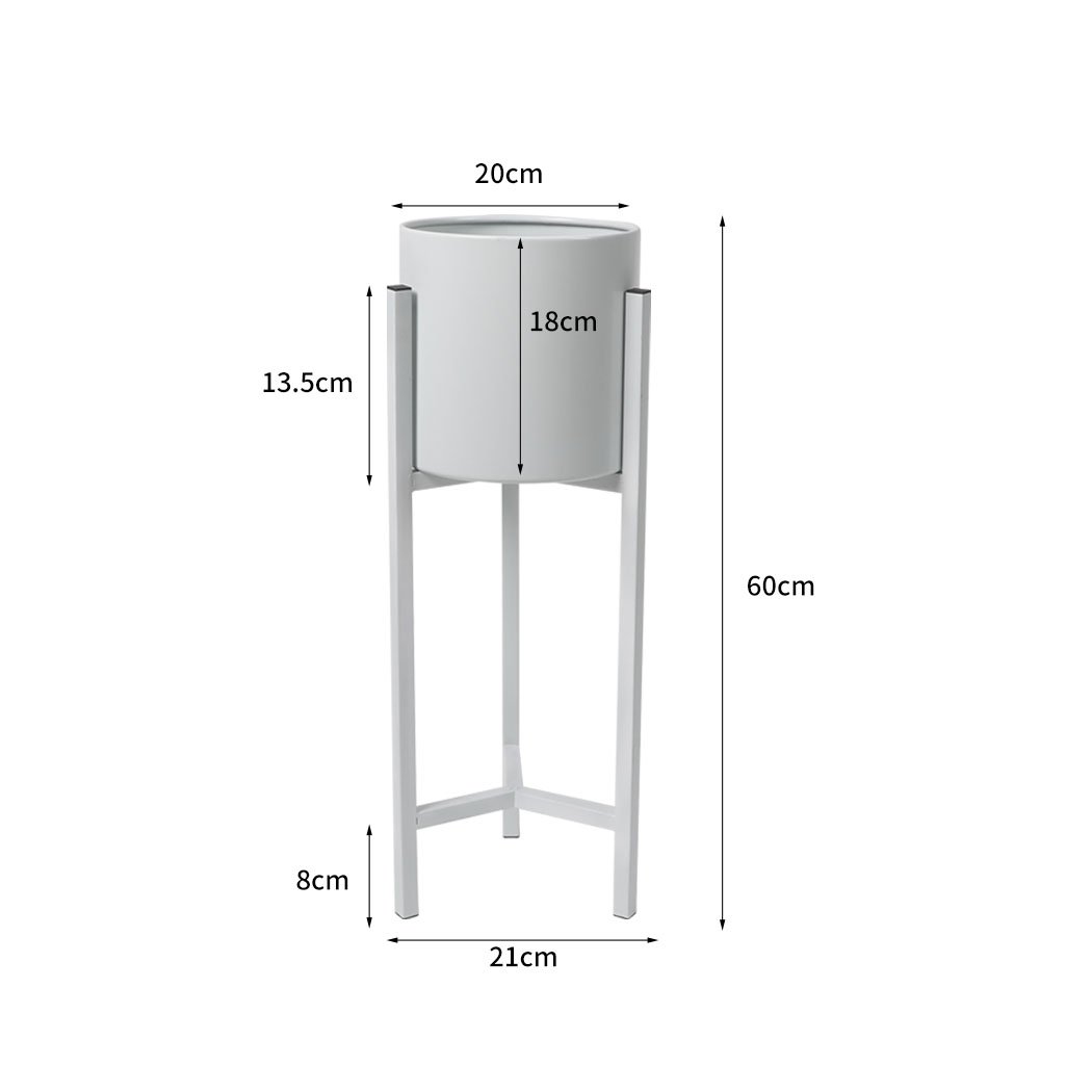 Stylish metal plant stand with a white finish, showcasing a beautiful flower pot, designed for indoor and outdoor use.