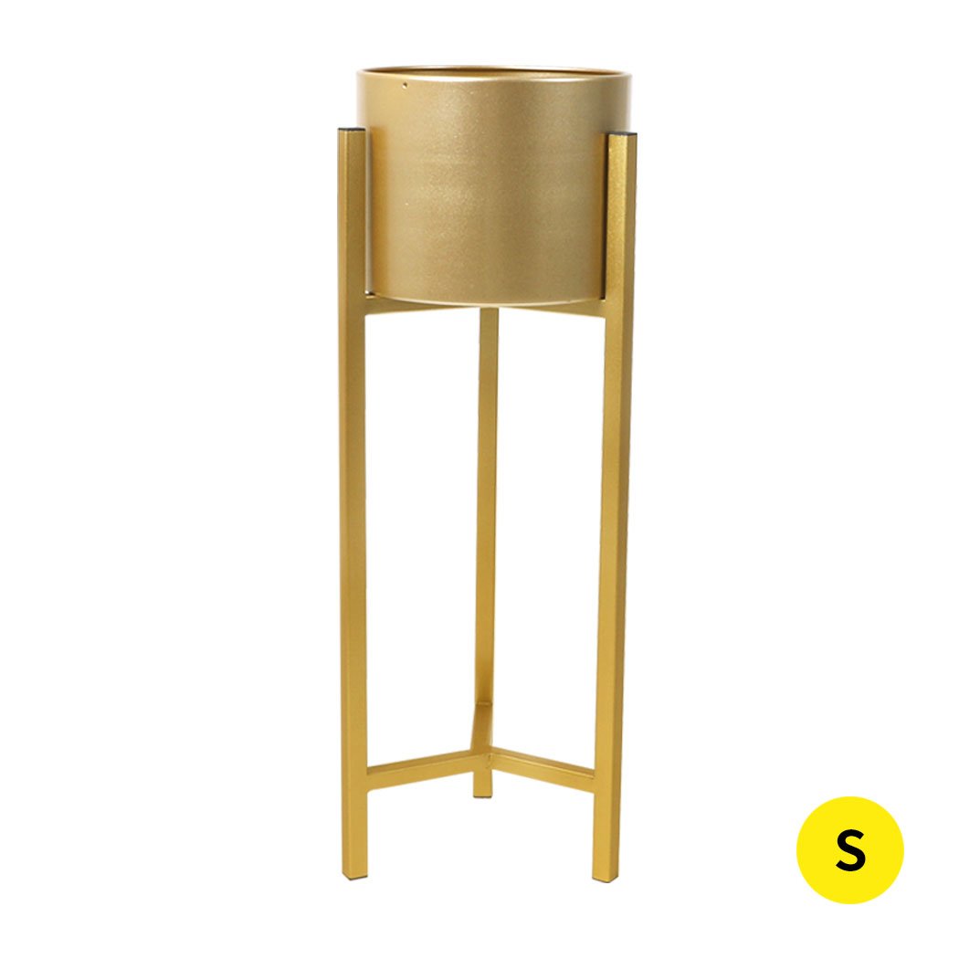 Elegant gold metal plant stand with a triangular base, showcasing a beautiful flower pot, perfect for indoor and outdoor use.
