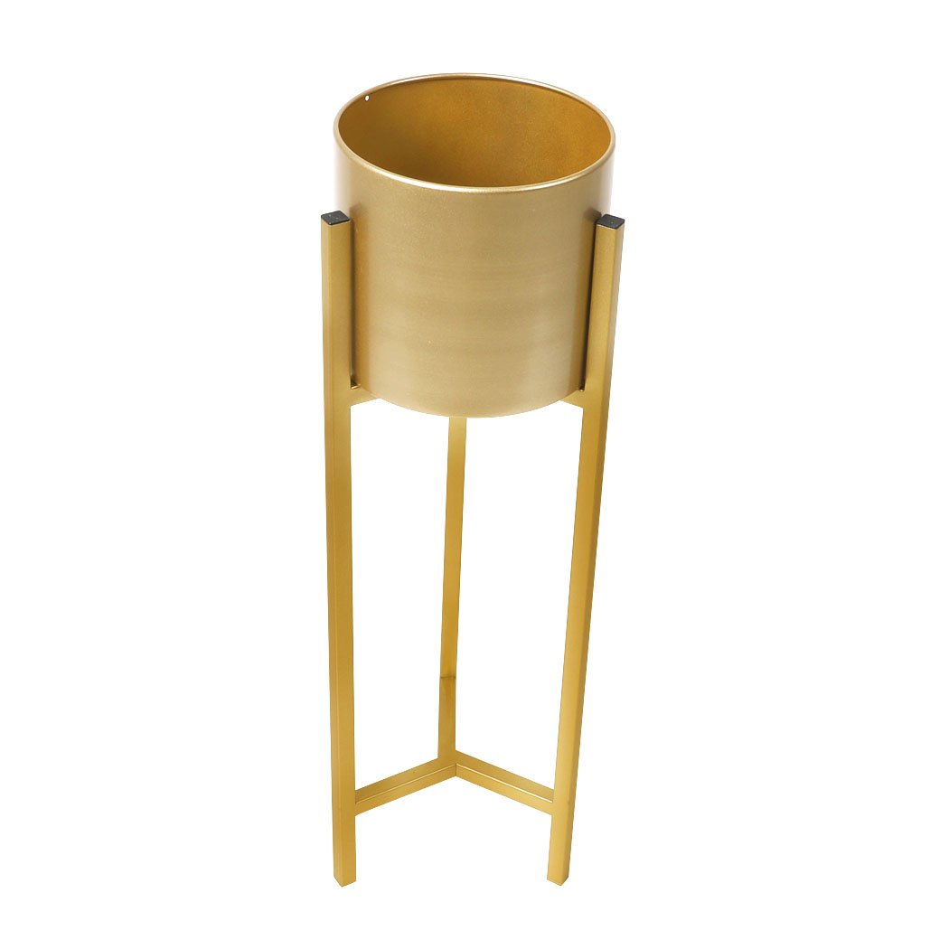 Elegant gold metal plant stand with a triangular base, showcasing a beautiful flower pot, perfect for indoor and outdoor use.