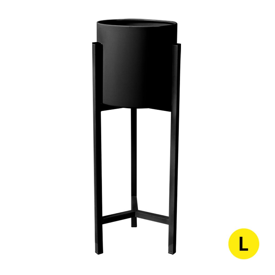 Stylish metal plant stand with a black finish, showcasing a beautiful flower pot, perfect for indoor and outdoor use.