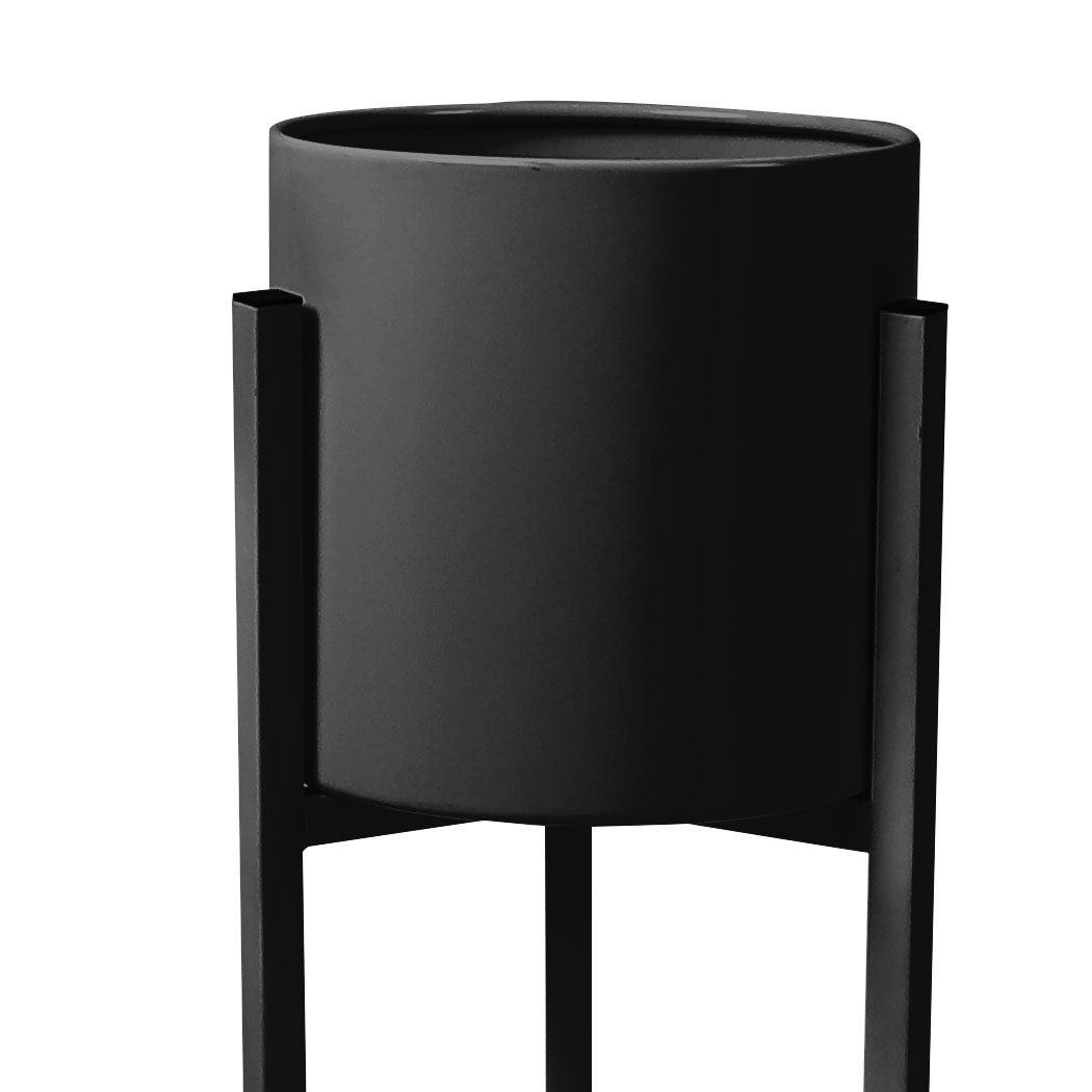 Stylish metal plant stand with a black finish, showcasing a beautiful flower pot, perfect for indoor and outdoor use.