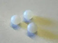 A close-up view of a Plastic Ball Plug designed for HP26 and HP29 models, showcasing its durable plastic material and round shape.