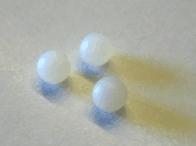 A close-up view of a Plastic Ball Plug designed for HP26 and HP29 models, showcasing its durable plastic material and round shape.