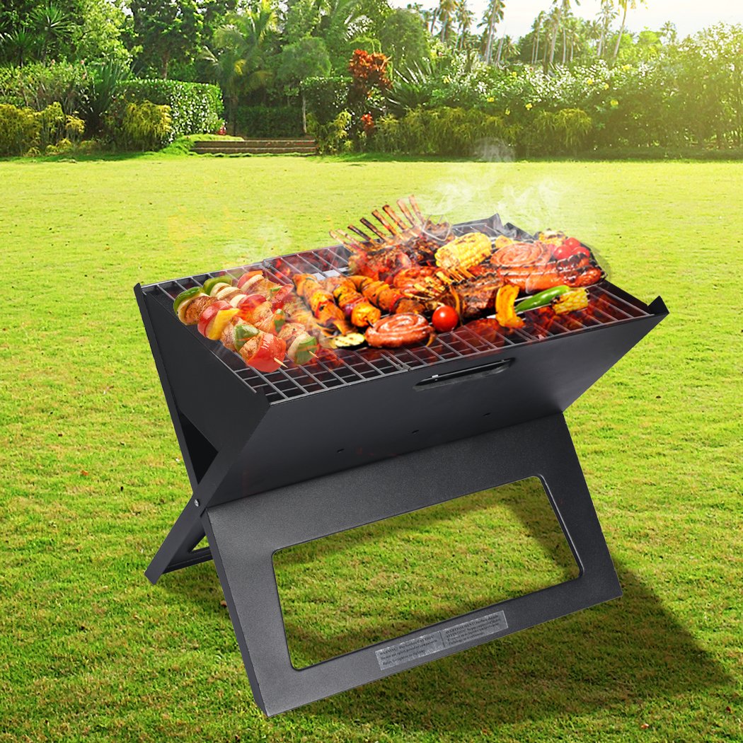 Portable BBQ Charcoal Grill with foldable design, ideal for outdoor cooking and camping.