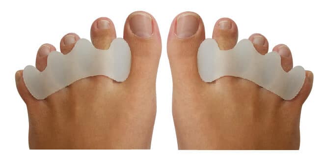 A pair of Premium Toe Spacers made from soft silicone gel, designed for toe alignment and comfort.