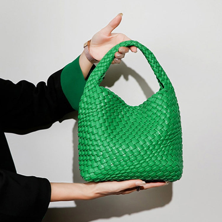 PU Leather Hand-woven Handbag featuring a braided design, adjustable strap, and stylish clutch.