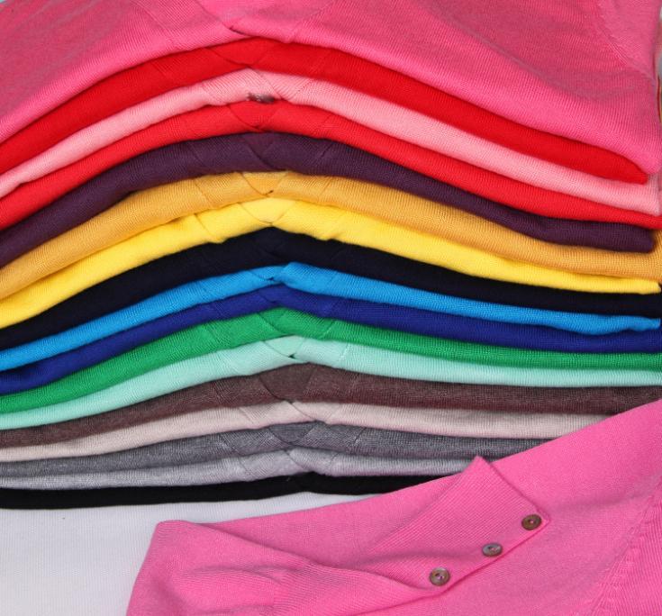 Quality Guarantee Spring Autumn Women Shell Button Cardigan in solid knit, featuring pockets and a V-neck collar, perfect for casual wear.