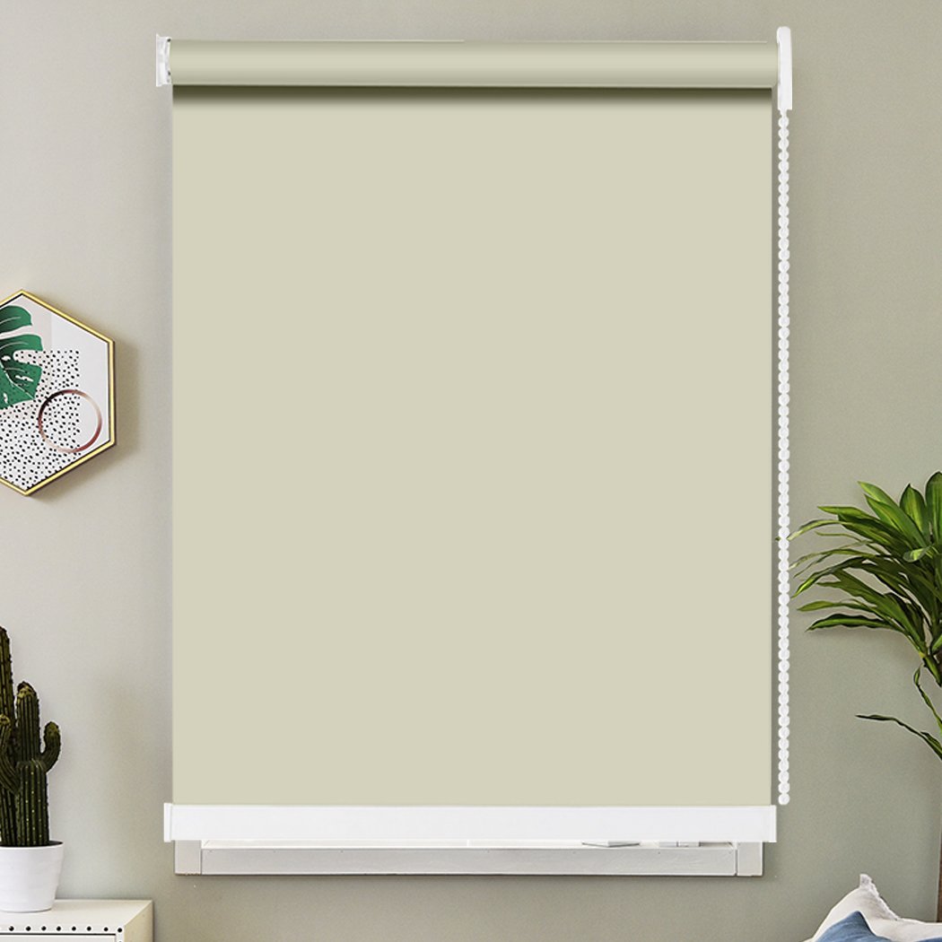 Quality Modern Blockout Roller Blinds in biscuit color, showcasing a sleek design and durable mechanism for full sun shading.