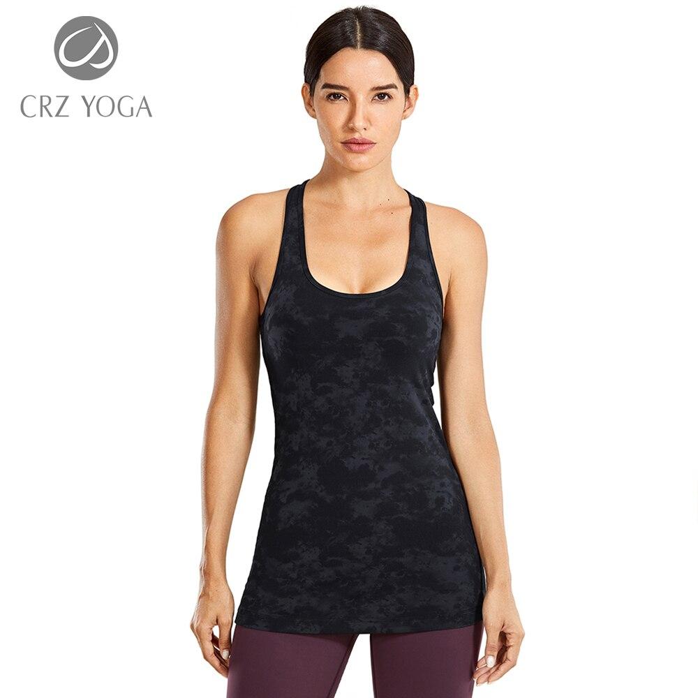 A stylish collection of Racerback Workout Tank Tops for Women in various colors including black, white, pink, and blue violet, showcasing their sleeveless design.