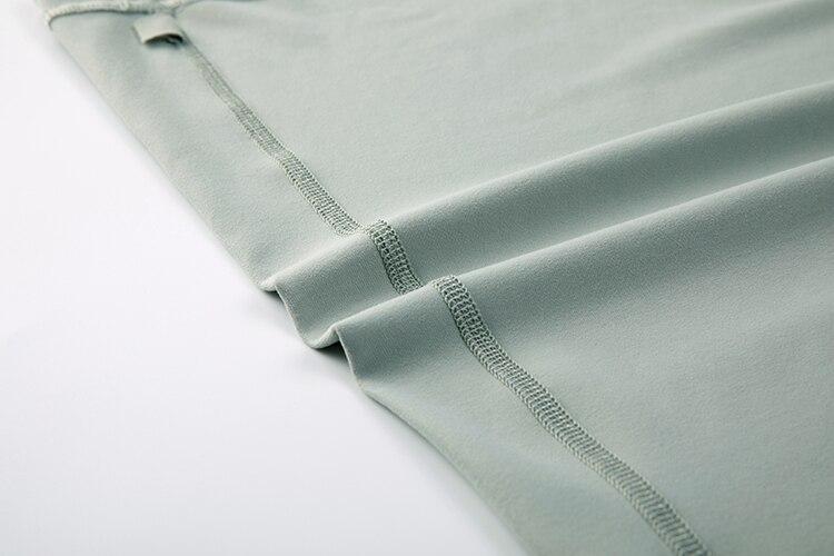 A stylish collection of Racerback Workout Tank Tops for Women in various colors including black, white, pink, and blue violet, showcasing their sleeveless design.