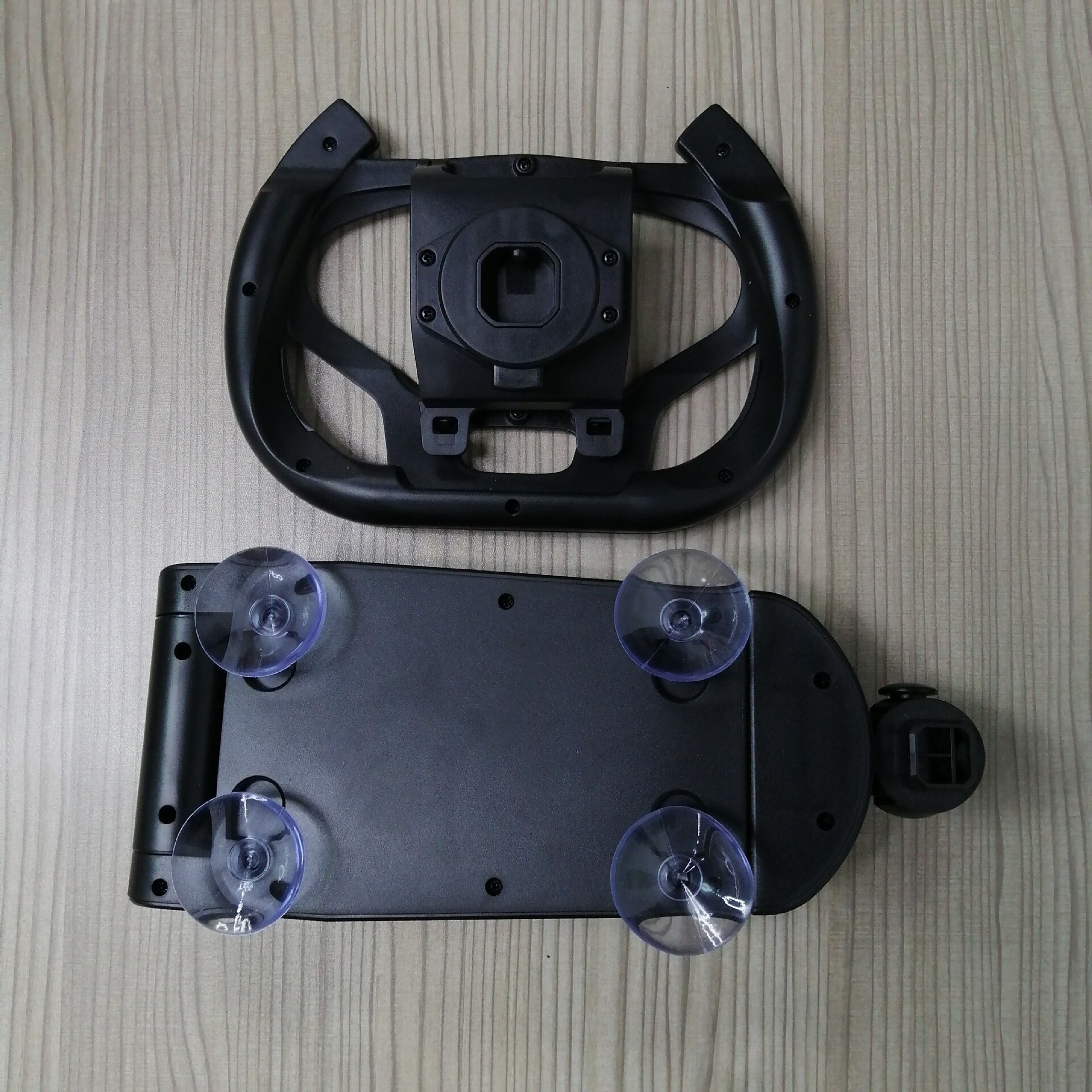 Racing Game Steering Wheel Bracket for PS5, showcasing its sturdy design and compatibility with steering wheels.