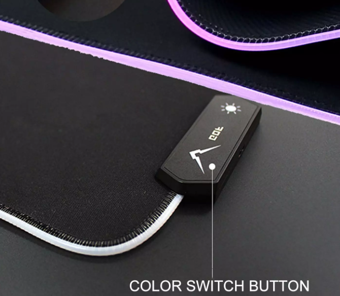 RBG Lightning Mode Extra Large Gaming Mousepad with vibrant RGB lighting and 14 modes, showcasing its sleek design and spacious surface.