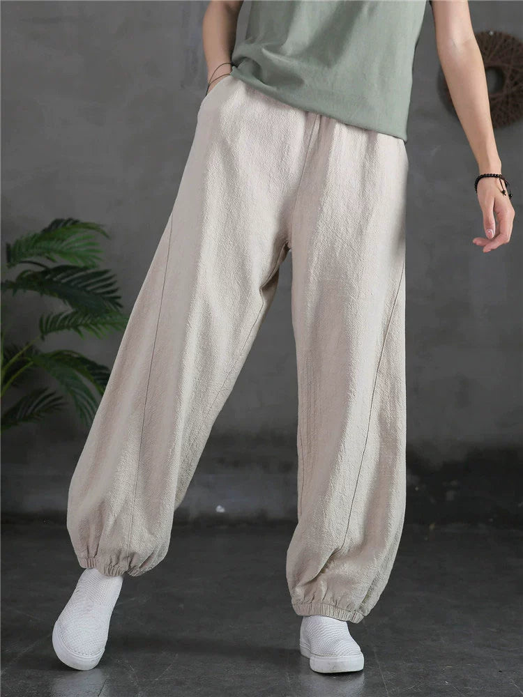 A pair of stylish high waist yoga pants made from soft linen, featuring a retro design suitable for autumn and winter wear.