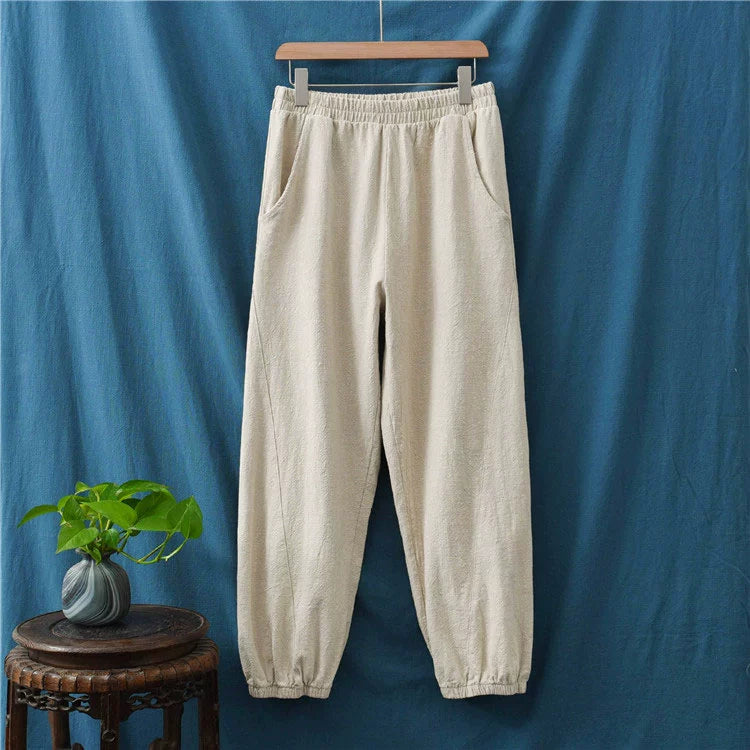 A pair of stylish high waist yoga pants made from soft linen, featuring a retro design suitable for autumn and winter wear.