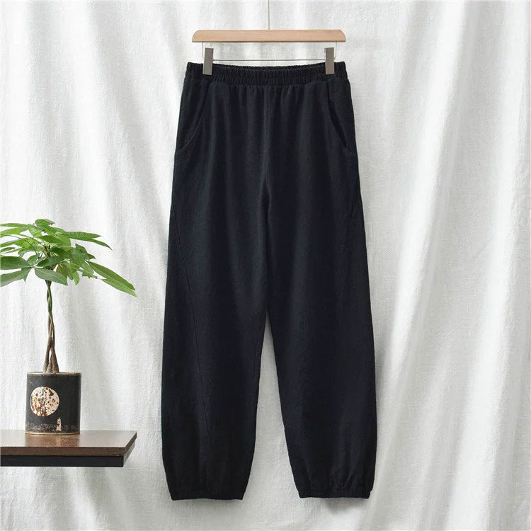 A pair of stylish high waist yoga pants made from soft linen, featuring a retro design suitable for autumn and winter wear.