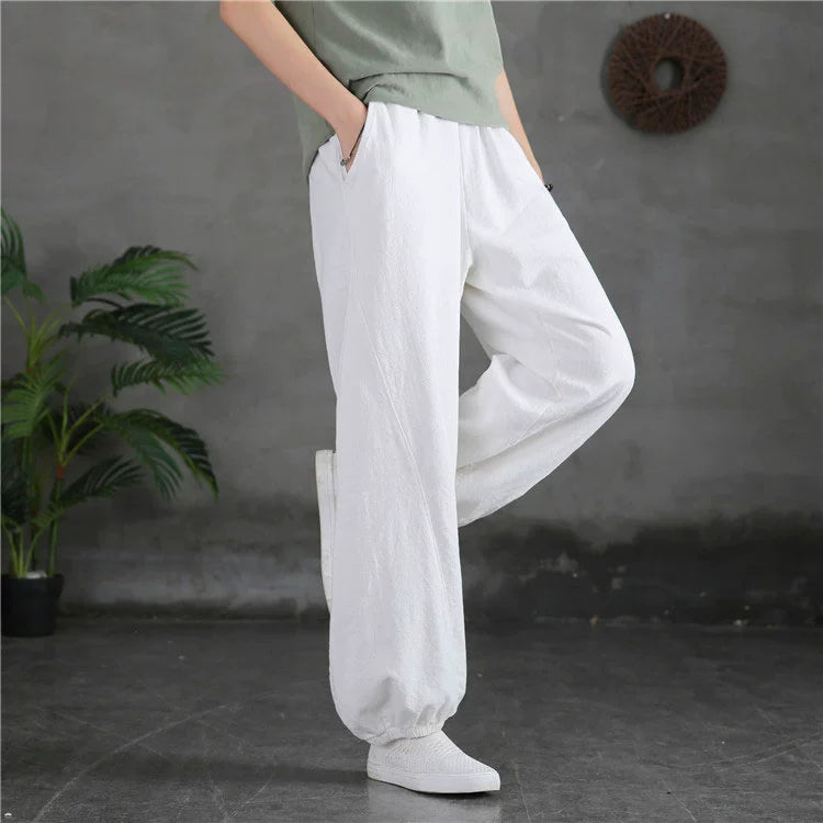 A pair of stylish high waist yoga pants made from soft linen, featuring a retro design suitable for autumn and winter wear.