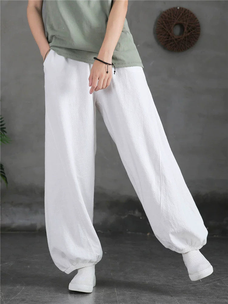 A pair of stylish high waist yoga pants made from soft linen, featuring a retro design suitable for autumn and winter wear.