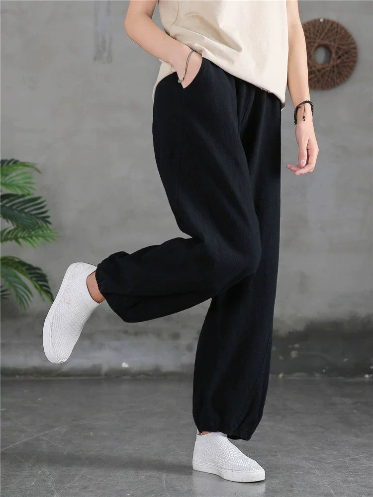 A pair of stylish high waist yoga pants made from soft linen, featuring a retro design suitable for autumn and winter wear.