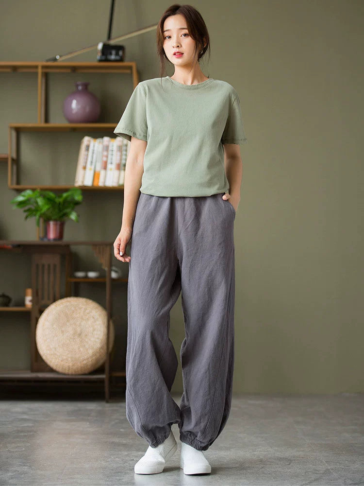 A pair of stylish high waist yoga pants made from soft linen, featuring a retro design suitable for autumn and winter wear.