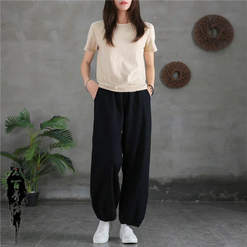 A pair of stylish high waist yoga pants made from soft linen, featuring a retro design suitable for autumn and winter wear.