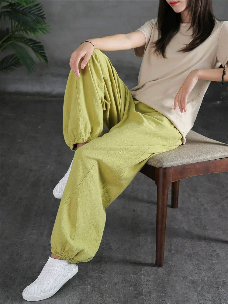 A pair of stylish high waist yoga pants made from soft linen, featuring a retro design suitable for autumn and winter wear.