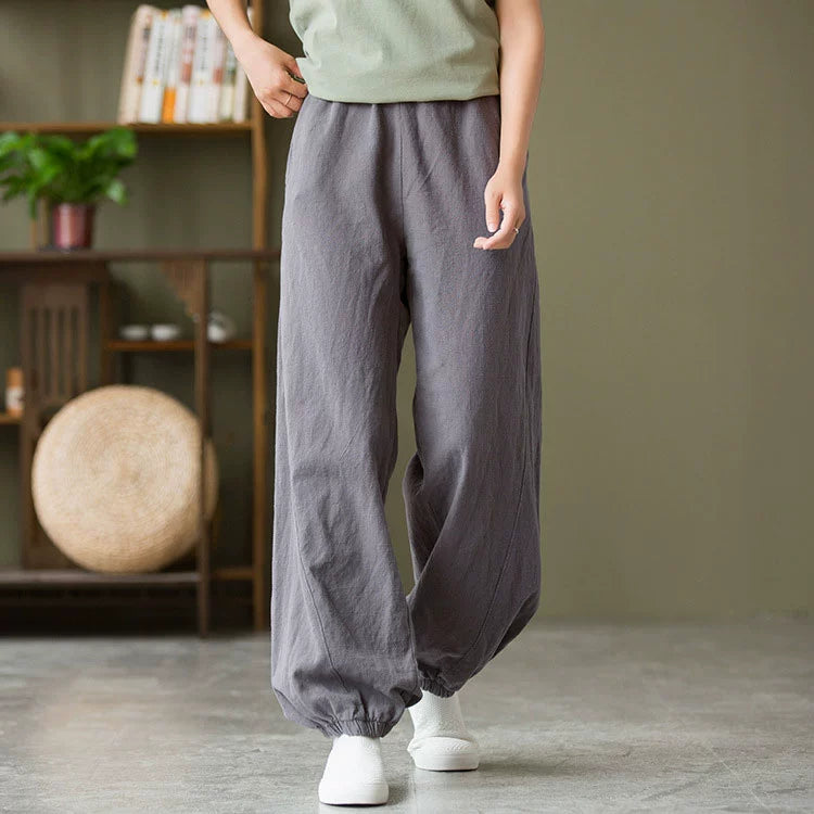 A pair of stylish high waist yoga pants made from soft linen, featuring a retro design suitable for autumn and winter wear.