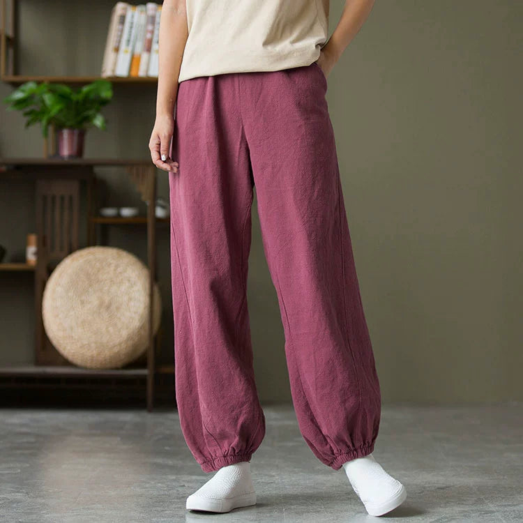 A pair of stylish high waist yoga pants made from soft linen, featuring a retro design suitable for autumn and winter wear.