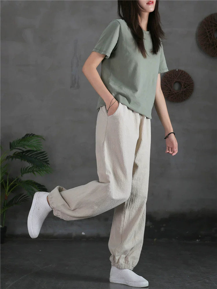 A pair of stylish high waist yoga pants made from soft linen, featuring a retro design suitable for autumn and winter wear.