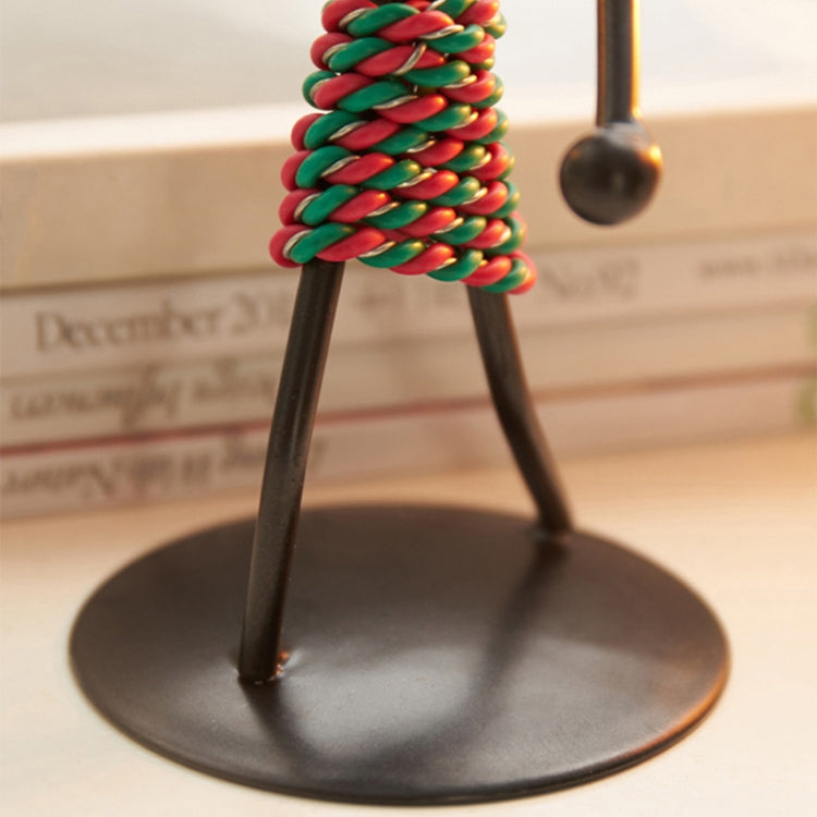 Retro Wrought Iron Man-shaped Candlestick Ornament, showcasing a unique design perfect for home and restaurant decor.